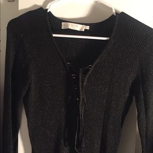 Long sleeve lace up black dress with gold sparkle